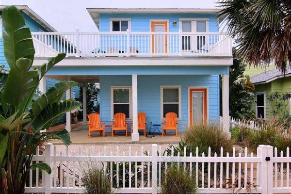 Private house rental with a white picket fence