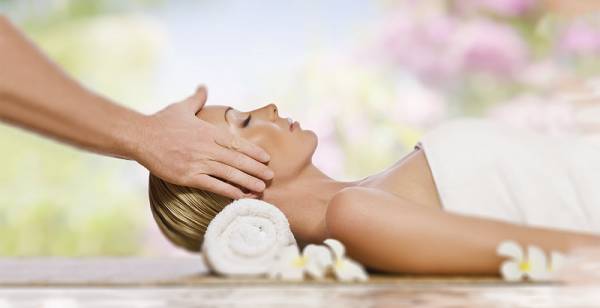 Woman getting a relaxing massage at the spa